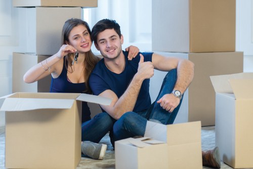 Professional furniture pick-up team in Tooting loading furniture