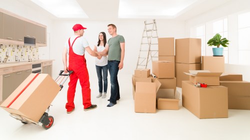 Movers packing furniture into a removal truck